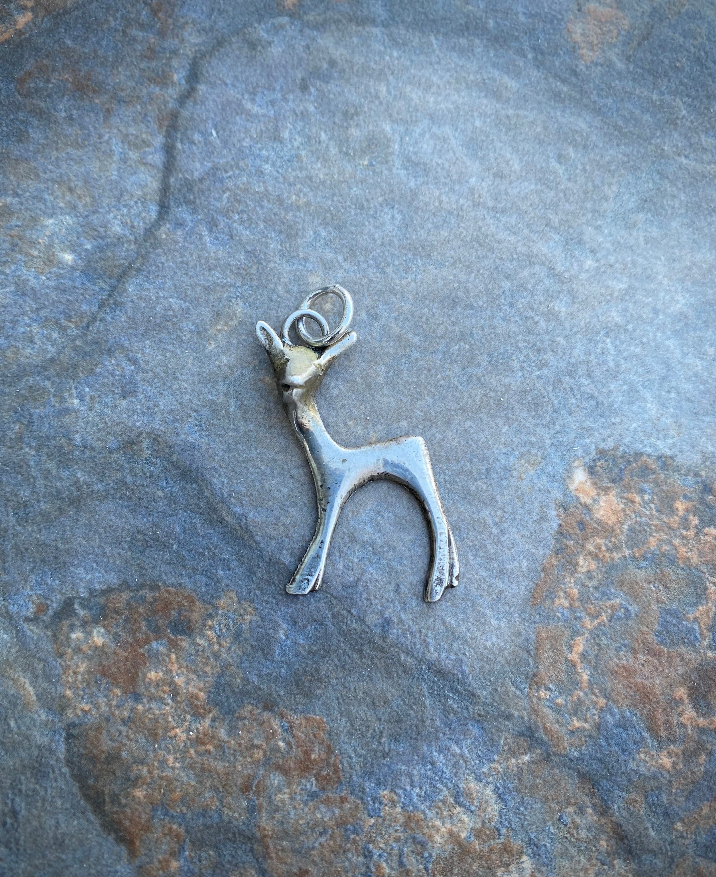 Vintage sterling silver deer pendant